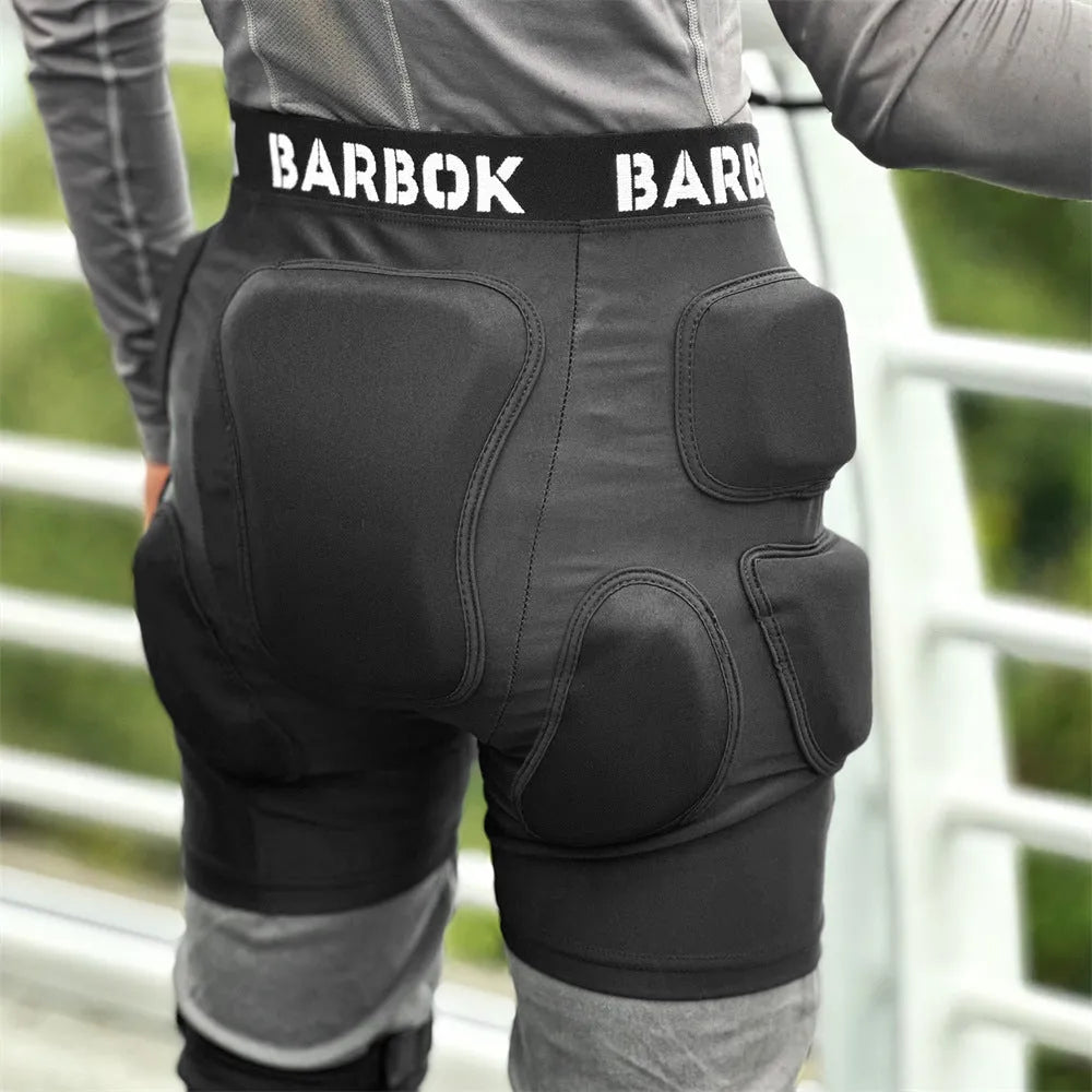 Black spandex hip protection pad pants with built-in grey NBR shock-absorbing pads for skating and skiing
