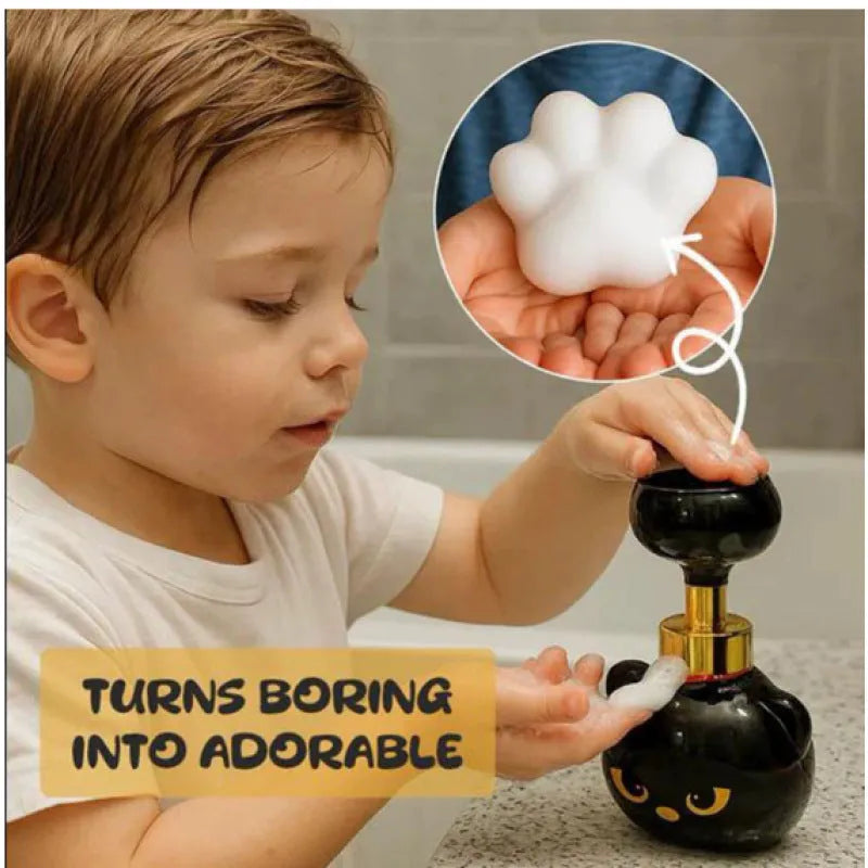 Black cartoon cat shaped plastic foam soap dispenser measuring 10x18cm