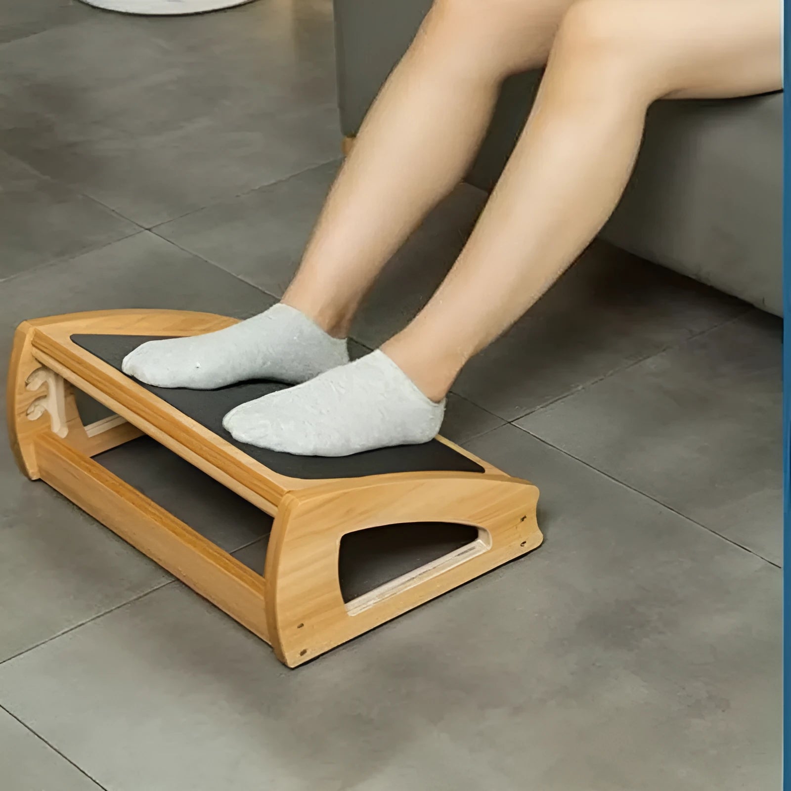 Natural wood colour bamboo adjustable office desk footstool for adult ergonomics.