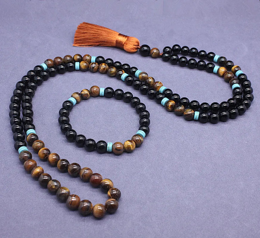 Natural agate and tigereye bead jewellery set showing black agate bracelet and necklace with tiger-shaped stone.