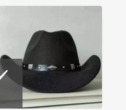 Brown leather velvet Western cowboy hat with a curved edge brim and conical crown.