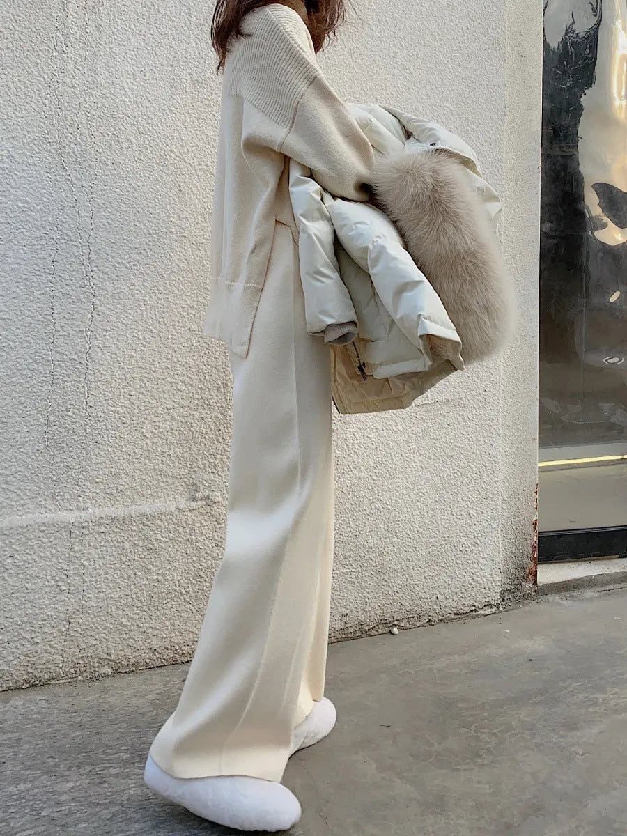 Women's high waist knitted wide-leg trousers in cream white colour with dropped mopping style