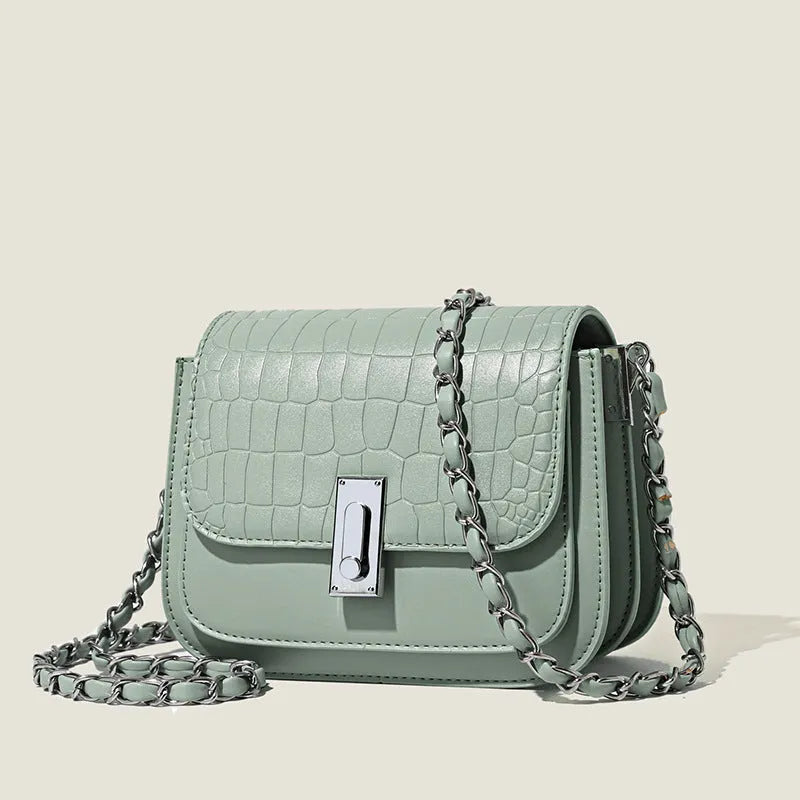 Women's soft PU leather shoulder bag with chain strap in horizontal square shape showing sandwich pocket design