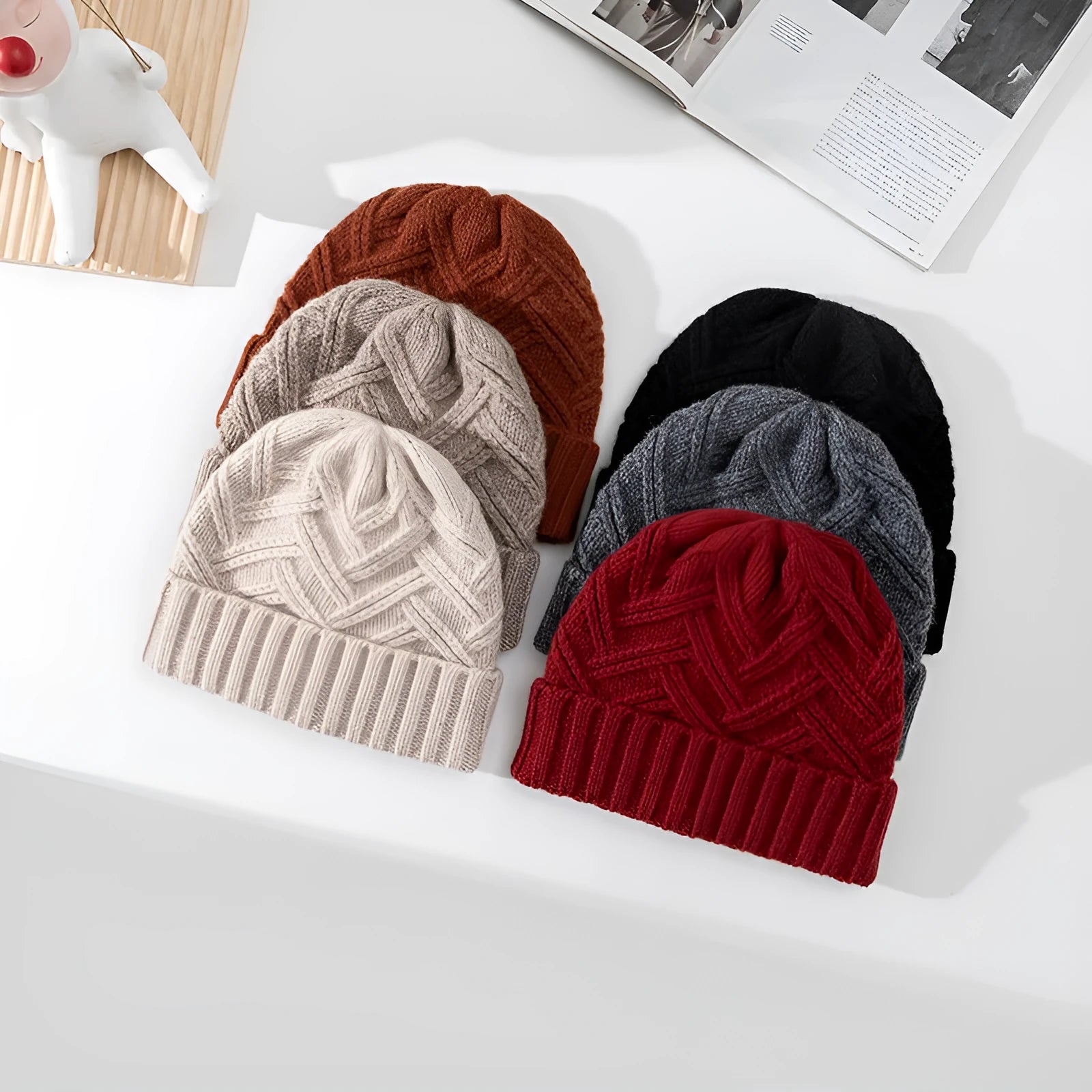 Wool knitted dome hat with totem pattern in ivory white, shown from side angle