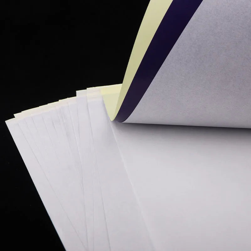 A4 tattoo transfer paper sheets in packaging showing carbon paper construction for stencil creation