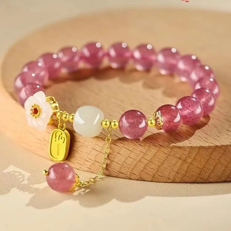 Handcrafted strawberry quartz crystal bracelet with green strawberry quartz moon charm for women