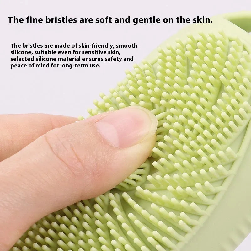 Silicone bath brush storage bottle in eight colour options on a bathroom shelf.