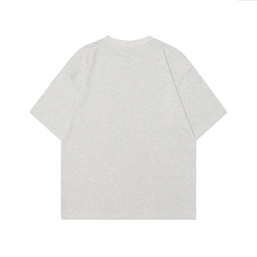 Men's black and grey retro character design short-sleeved cotton T-shirt shown in loose fit.