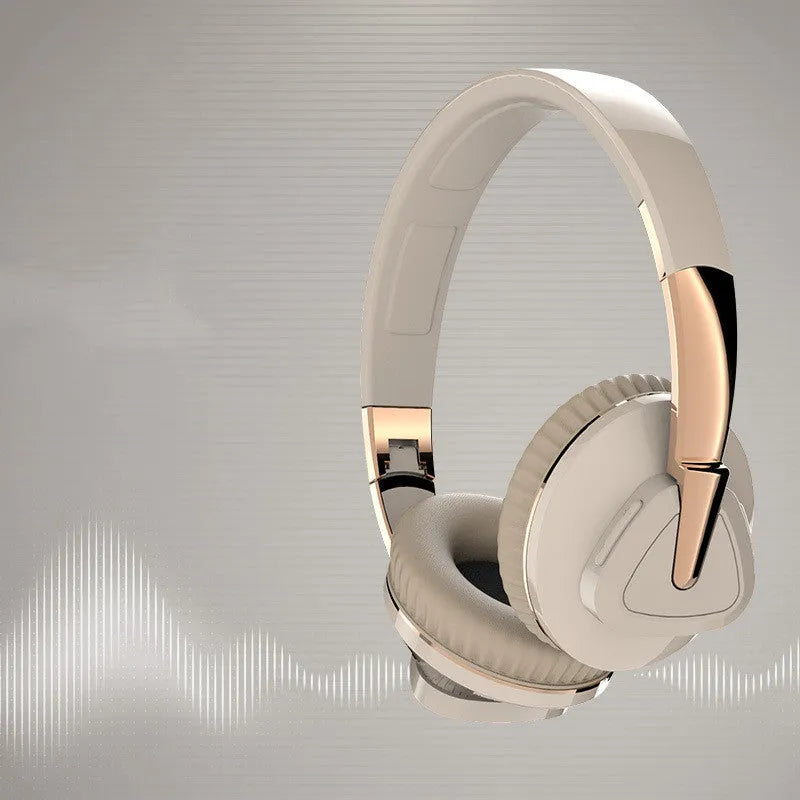 Wireless Bluetooth headset in black colour showing ear cushions with AUX audio jack and control buttons