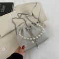 Western-style diamond shoulder bag with chain crossbody strap in bucket shape