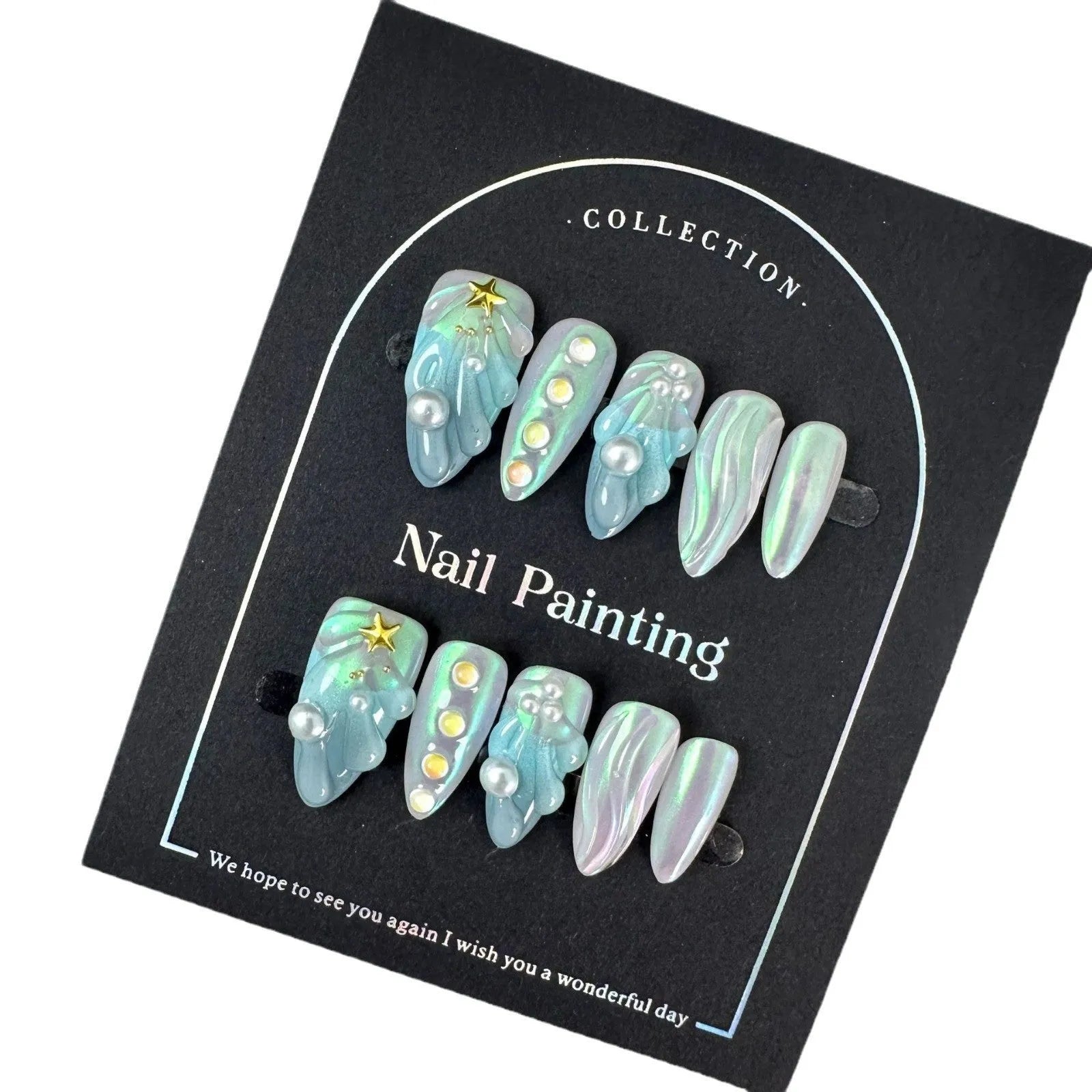 Blue plastic nail stickers and wearable nail armour pieces set on a white background.