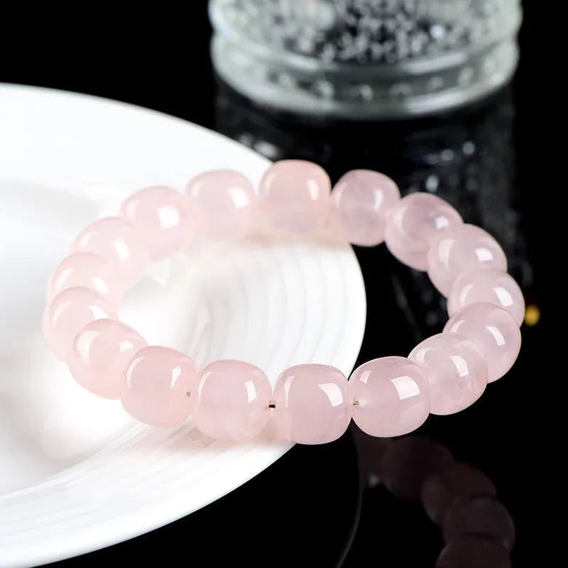 Pink crystal barrel bead bracelet with 11x12mm geometry beads and grinding finish