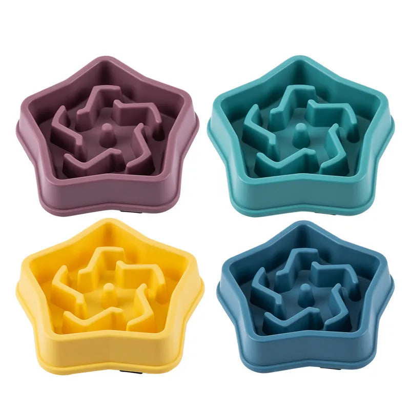Yellow plastic dog slow feeder bowl with textured bottom and interior feeding obstacles