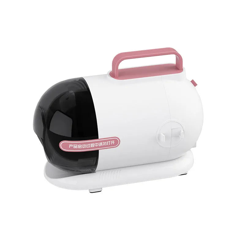 Pink and white pet grooming vacuum cleaner with hair clipper attachment and accessories on a white background.