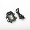 Mini black tactical warning flashlight with USB charging cable for backpack mounting.