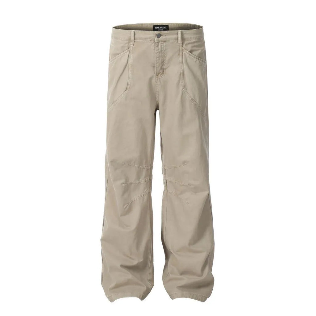 Men's brown straight-leg cotton trousers showing high-waist design and traditional straight-leg silhouette