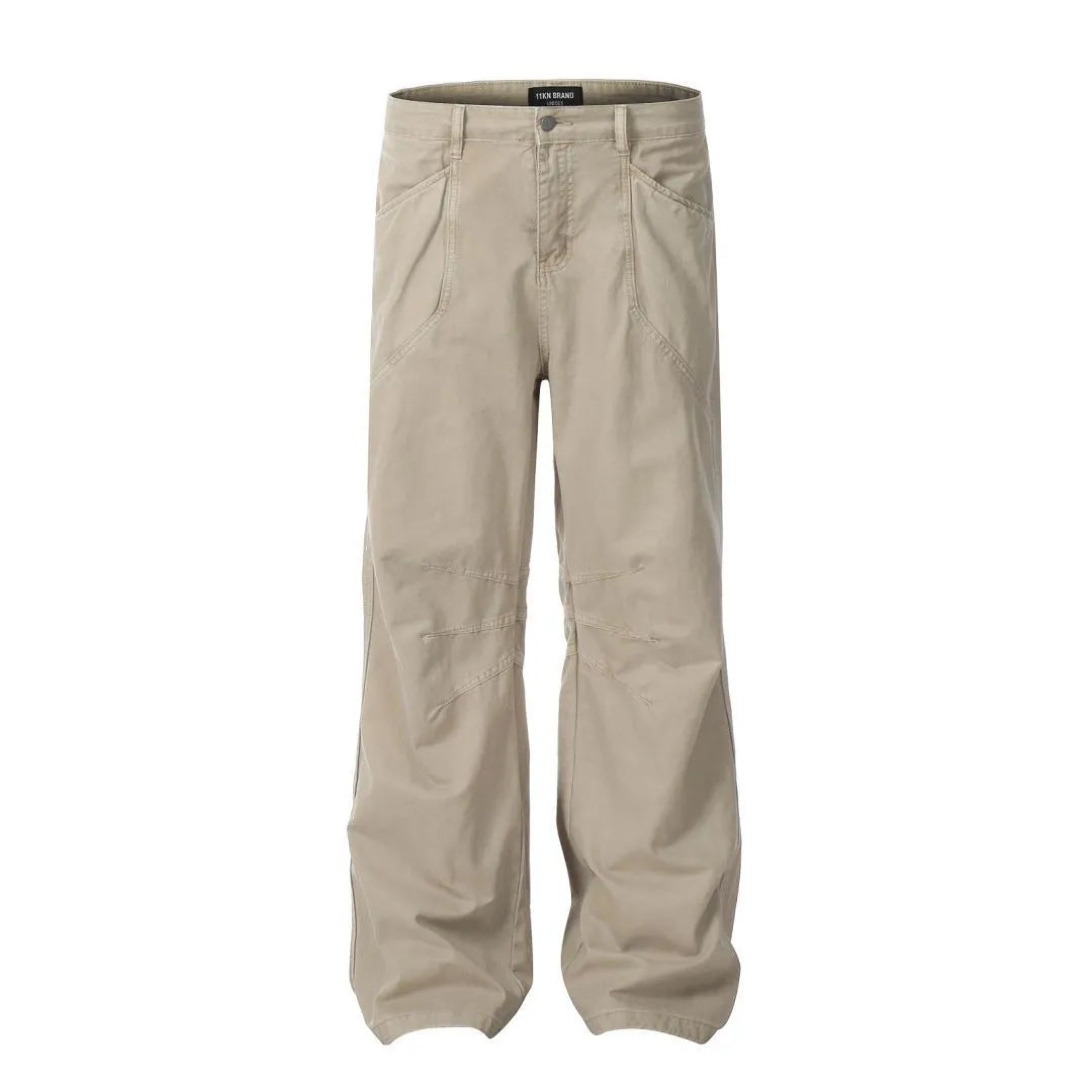 Men's brown straight-leg cotton trousers showing high-waist design and traditional straight-leg silhouette