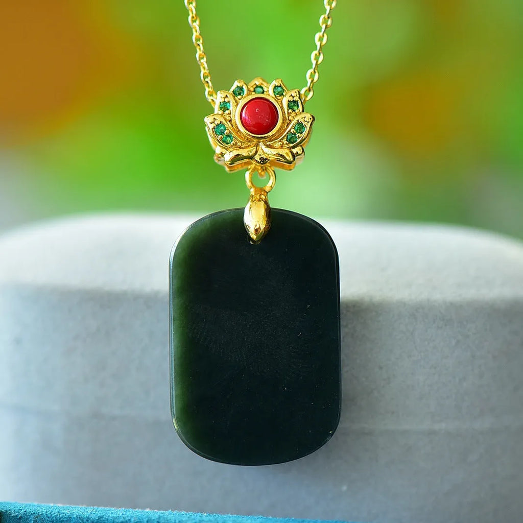 Natural Hetian gray jade pendant with copper inlay detailing showing ink blue jadeware patterning