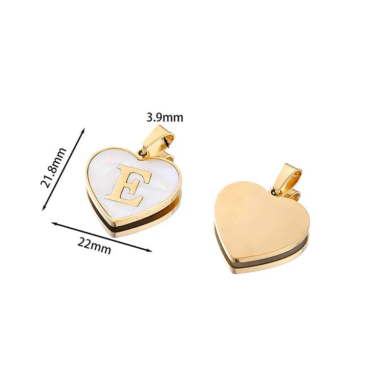 Gold heart necklace with white shell pendant and initial charm on 45cm adjustable chain