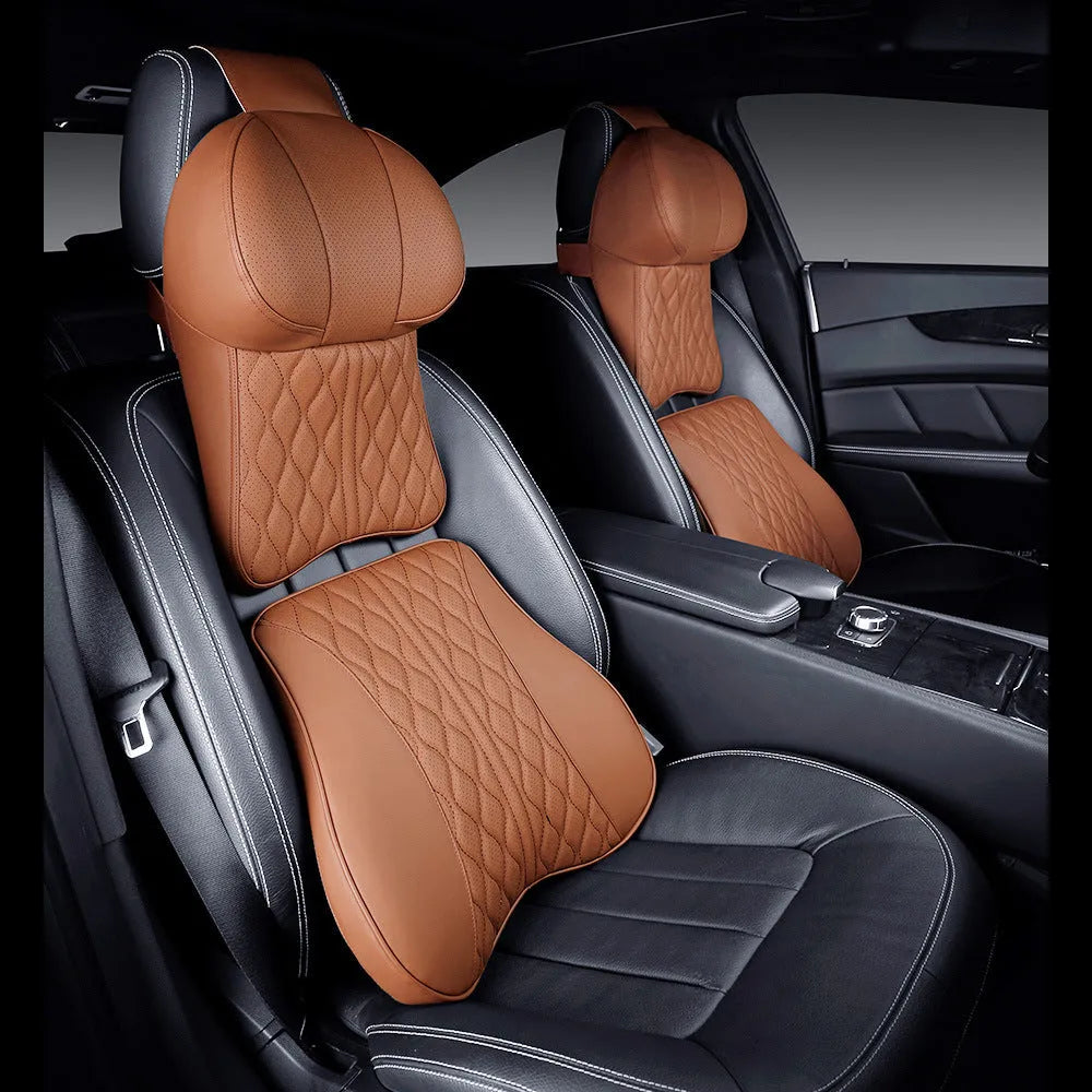 Car neck pillow and matching lumbar support cushion with embroidered wavy pattern in beige colour