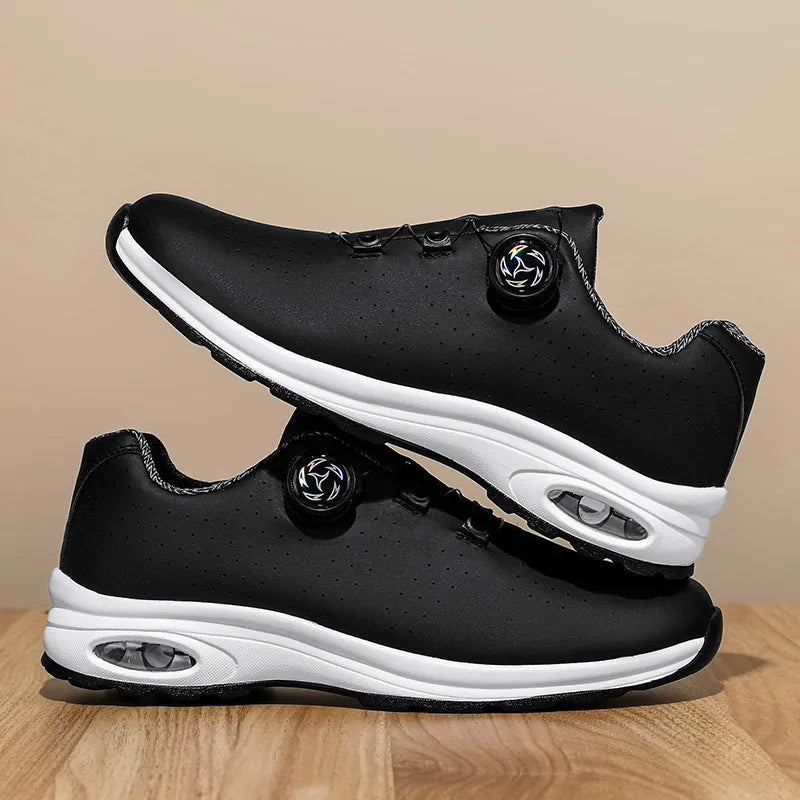 Men's black and white low-top mesh casual tennis shoes with cross straps and lace-up front