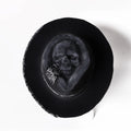Handmade wool skull hat with conical crown and embroidered design