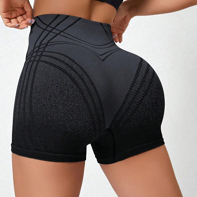 Brown and black gradient high waisted fitness shorts for women on a mannequin.