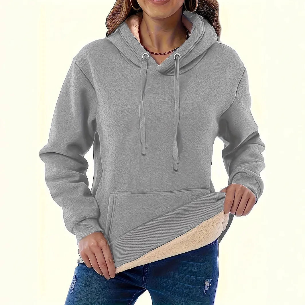 Women's loose-fit black hooded sweater with side pockets and a 3D pattern on the front.