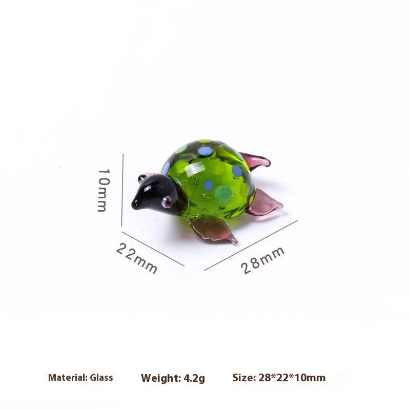 Glass turtle ornament with geometric modern design in six colour variations for desktop decoration