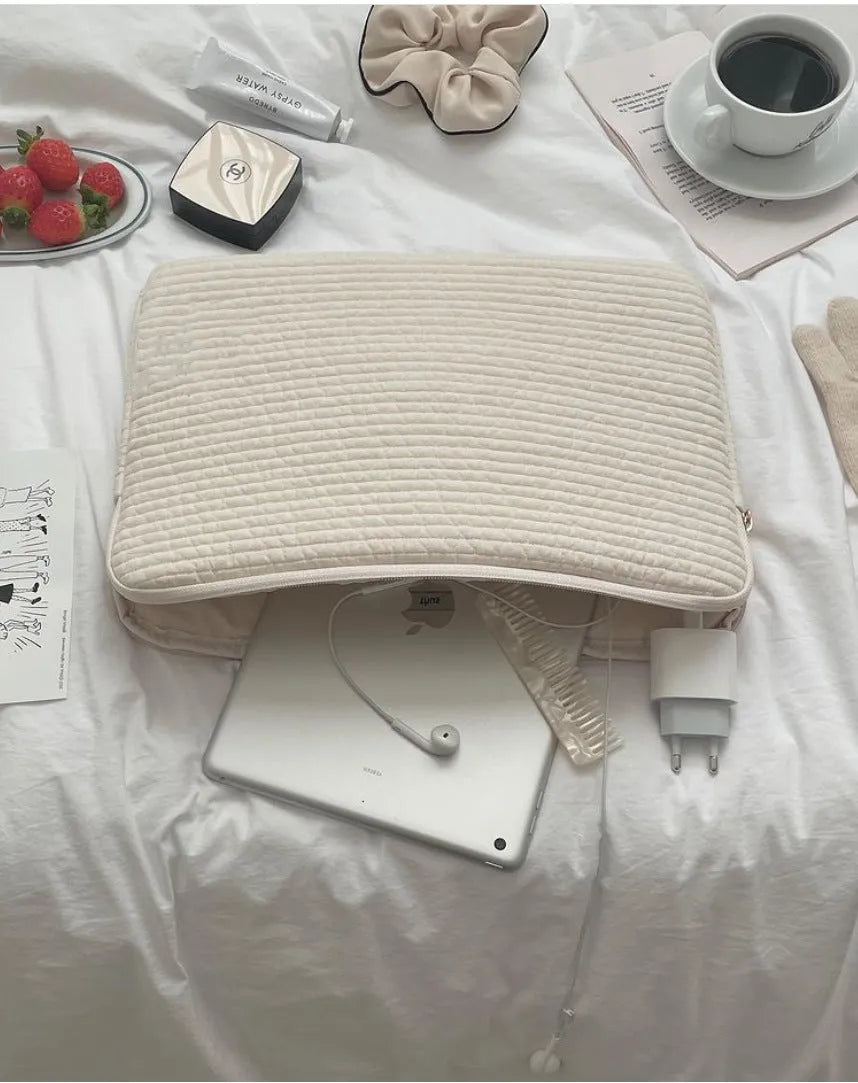 Black and white cotton cloth anti-seismic laptop sleeve or clutch bag for tablets, shown in three size options.