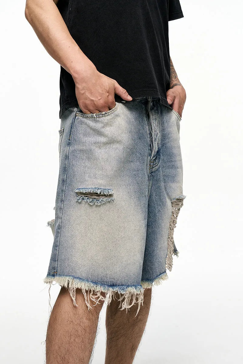 Men's light blue retro washed baggy denim shorts with wide leg and zipper fly