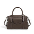 Genuine leather ladies handbag with lock detail in black, brown, or elephant grey.