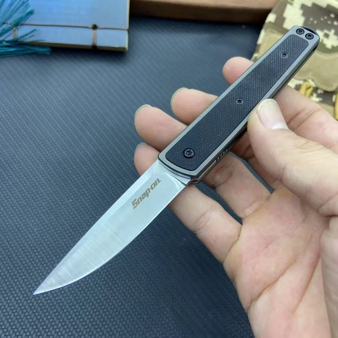Handmade folding fruit knife with stainless steel blade in black, red, or coffee colour.