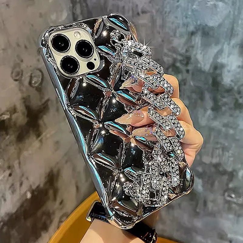 Silver diamond bracelet phone case for iPhone with chain and rhinestone lock on a TPU back.