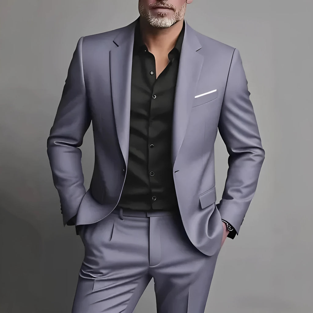 Men's slim fit casual two-piece suit set in black cotton blend fabric with coat and trousers on a hanger.