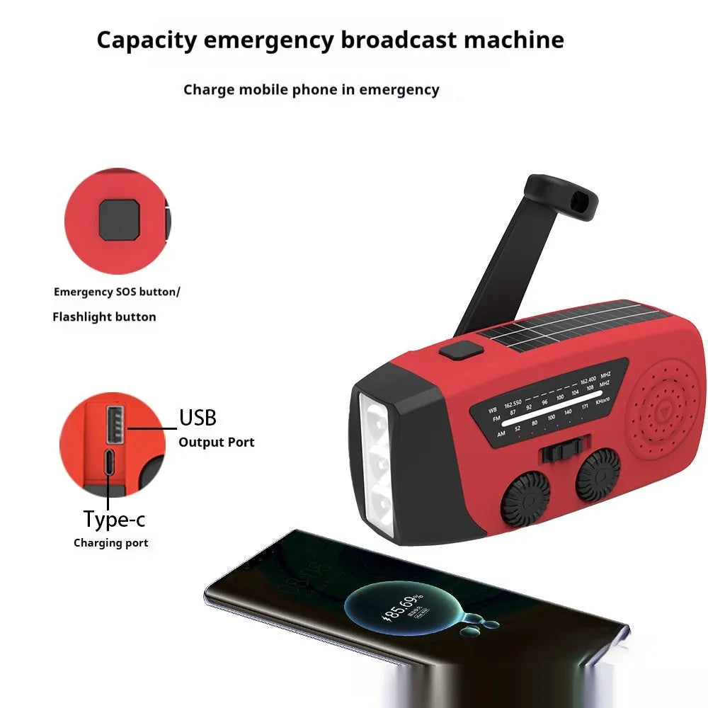 Red rechargeable emergency hand radio torch with USB port and wrist strap