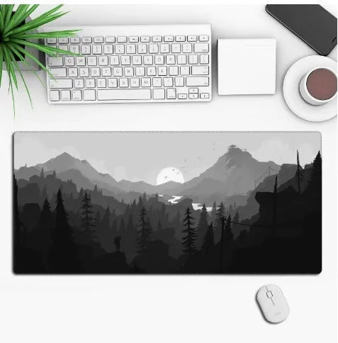 Large custom anime print gaming mouse pad on a desk with keyboard and mouse.