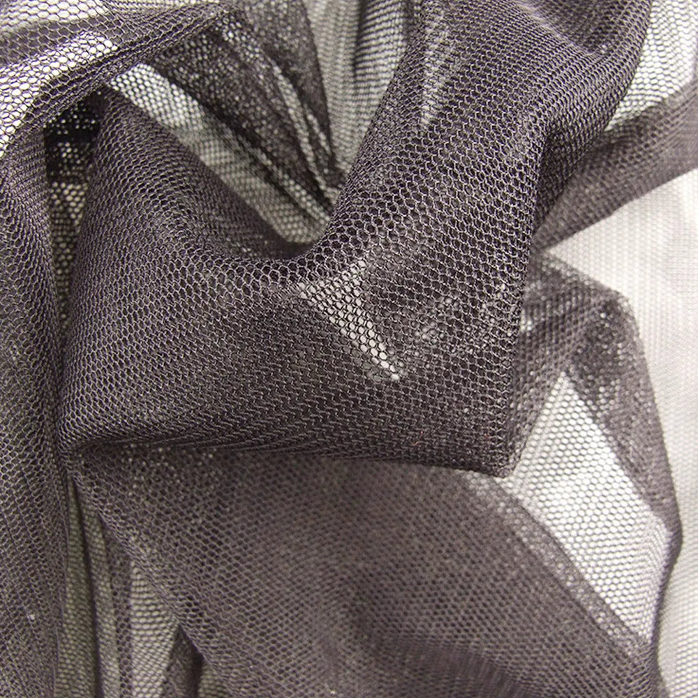 Four-piece mosquito-proof suit set showing hooded jacket, pants, and booties in breathable mesh fabric