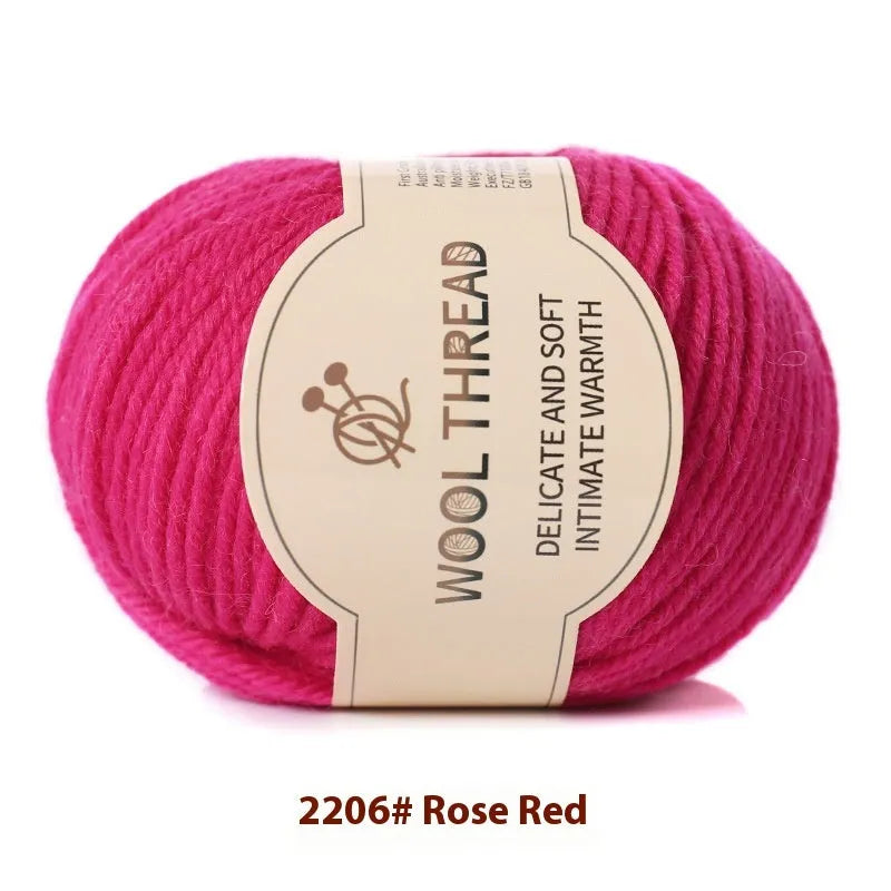 Roll of domestic wool knitting yarn for 10 needles in various colours including green, red, and blue