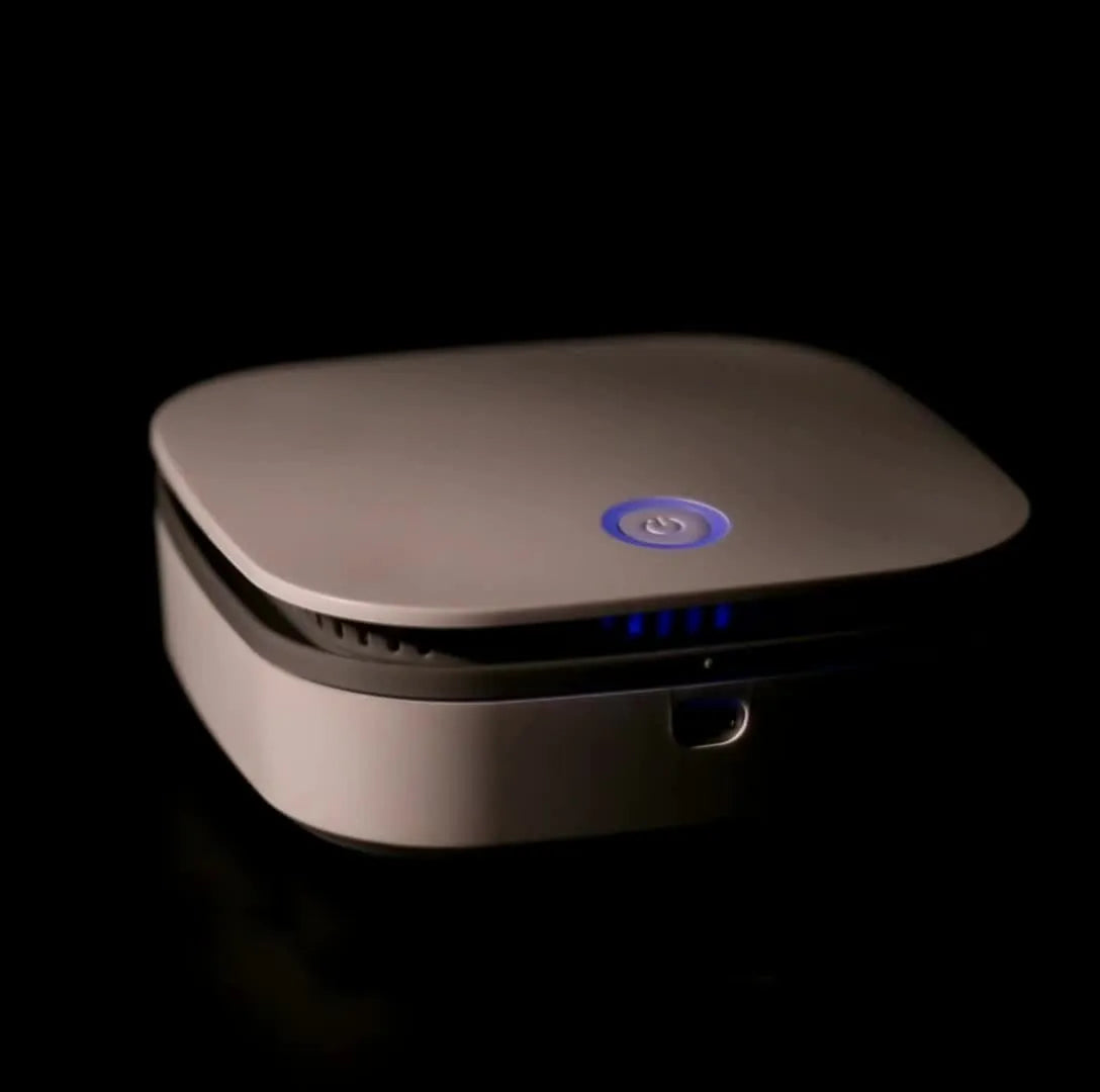 White portable USB air purifier for car and small room odor removal and disinfection.