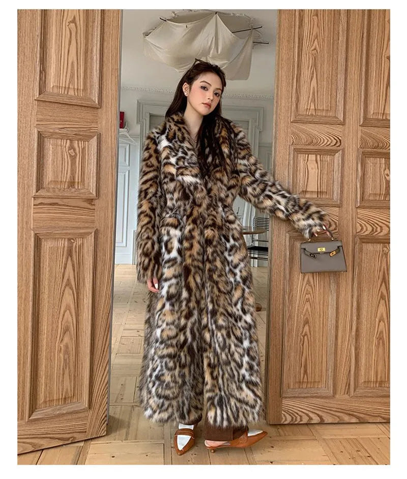 A long faux fur street fashion coat with a fur collar and pockets, shown in an urban setting.