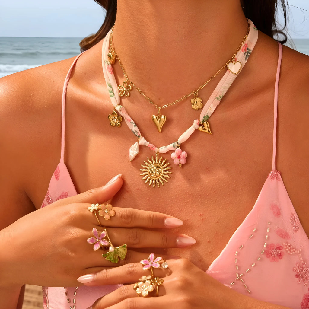 Gold plated stainless steel necklace with geometric sun pendant on adjustable 41-50cm chain