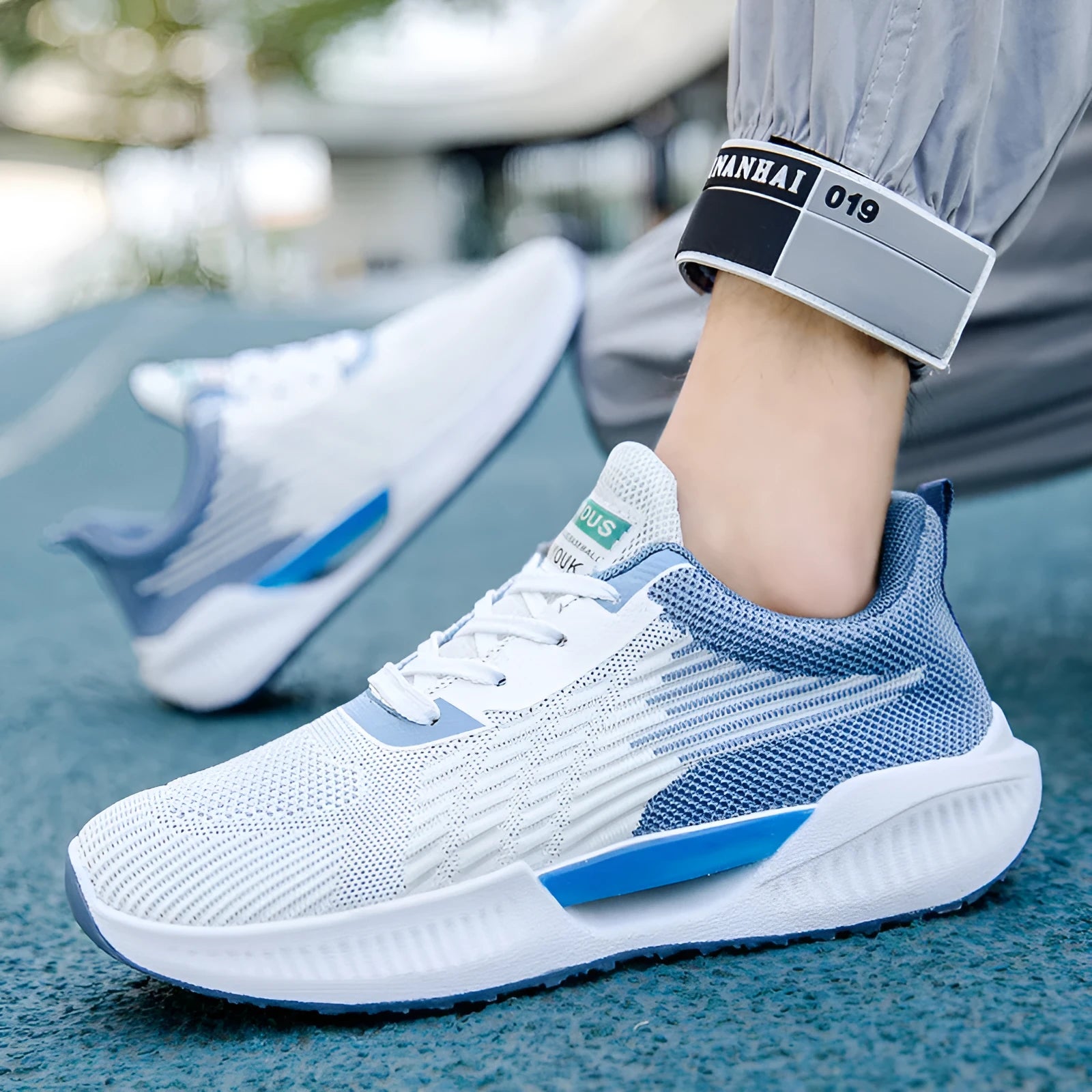 Men's blue casual mesh shoes with cloth upper and round toe design for leisure activities