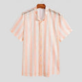 Pink men's loose fit short sleeve cardigan with waffle hole texture on a hanger
