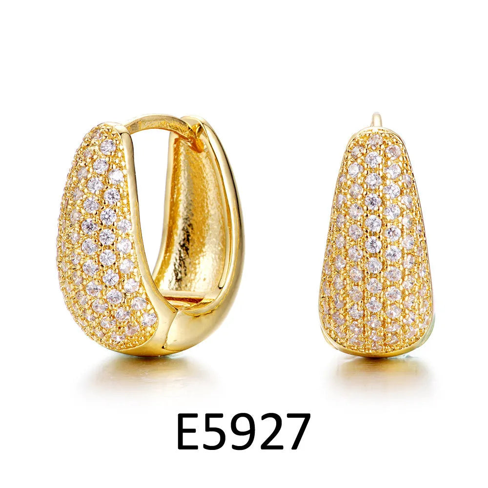 Brass electroplated copper ear clip earrings with heart shape zircon stone design in gold colour