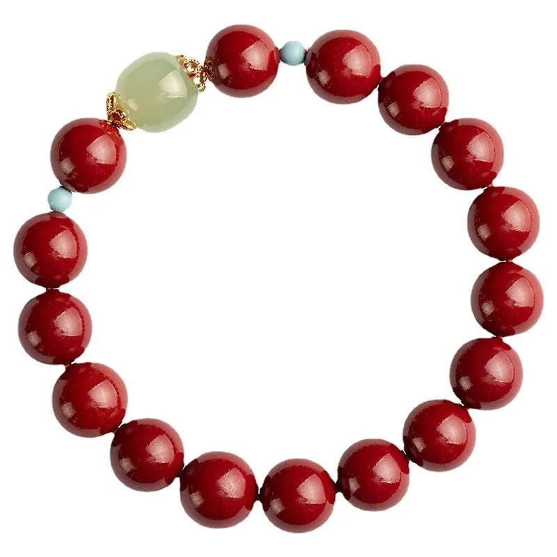 Geometric cinnabar and Hetian jade bead bracelet in purple gold sand colour on a wrist.