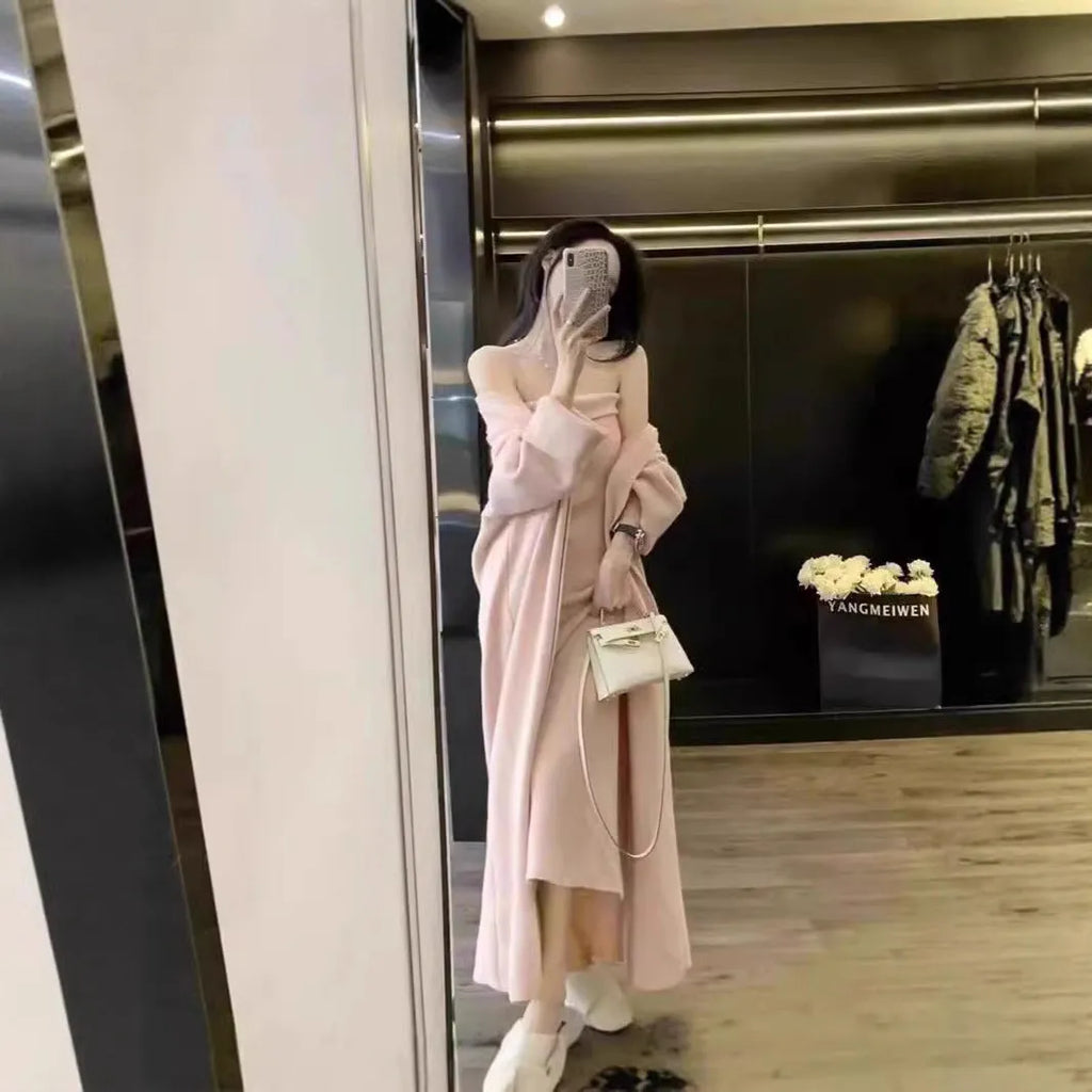 Women's gray knitted cardigan dress suit set with long skirt and regular sleeves.