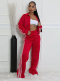 Street hipster two-piece striped suit set with top and trousers in polyester fabric
