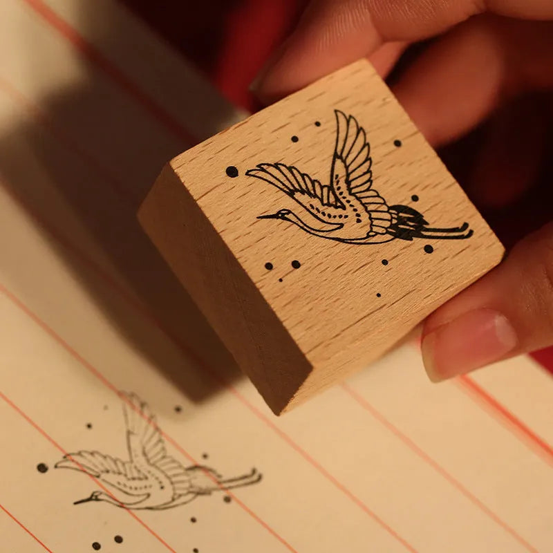 Wooden DIY stamp set with traditional crane designs for stationery decoration