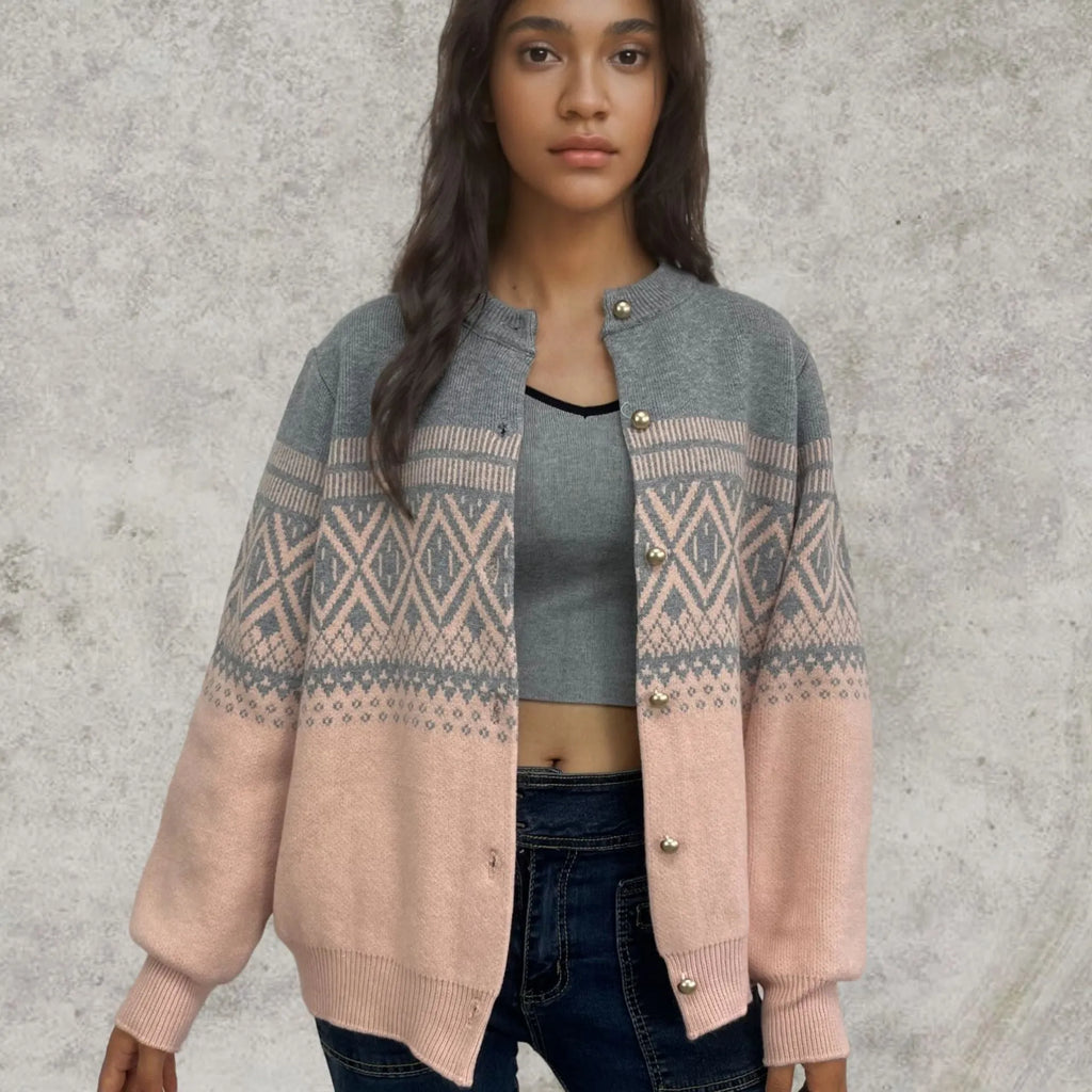 Women's long-sleeved grey alpaca wool cardigan with contrasting diamond knit pattern.